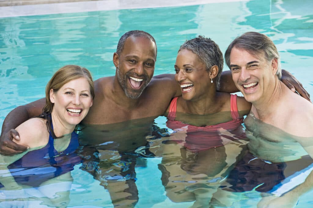 four people in pool