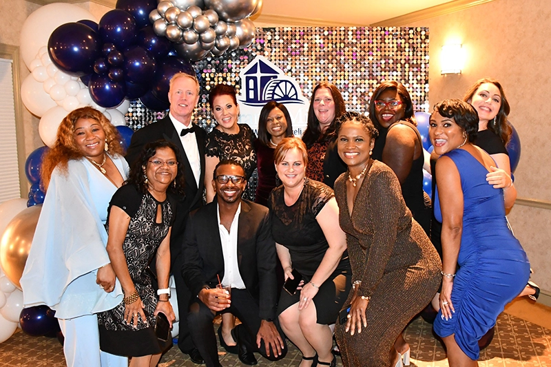 Group of people at celebration posing